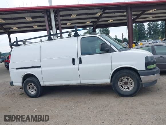 2020 Chevrolet Express Cargo with VIN 1GCWGAFP1L1167305, listed as a IAAI auction lot 42919010 with 35,381 mi miles and . Bid and sale history available at DreamBid. Image 12.