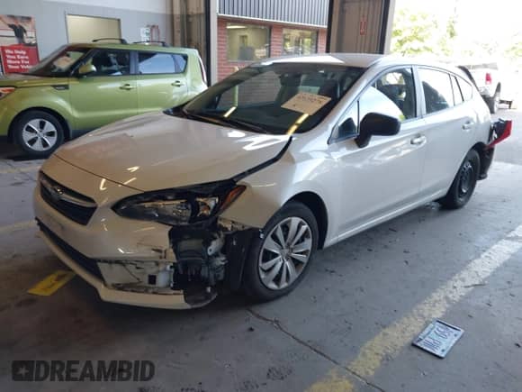 2020 Subaru Impreza with VIN 4S3GTAB6XL3721457, listed as a IAAI auction lot 42639278 with 58,980 mi miles and . Bid and sale history available at DreamBid. Image 17.