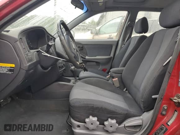 2006 Hyundai Elantra GLS z VIN KMHDN56D86U183512, wystawiony jako Copart lot #56918045 z przebiegiem 247 802 mil mil oraz Szkoda całkowita • Salvage title. Historia ofert i sprzedaży dostępna na DreamBid. Obrazek 7.