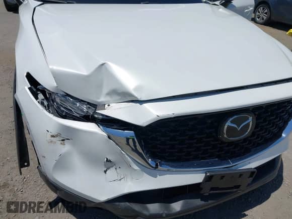 2023 Mazda CX-5 S Carbon Edition z VIN JM3KFBCM9P0286384, wystawiony jako IAAI lot #42497951 z przebiegiem 9 448 mil mil oraz . Historia ofert i sprzedaży dostępna na DreamBid. Obrazek 6.