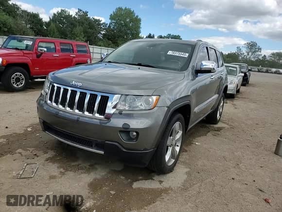 2012 Jeep Grand Cherokee Limited z VIN 1C4RJFBG5CC102608, wystawiony jako Copart lot #70375545 z przebiegiem 103 079 mil mil oraz Szkoda całkowita • Salvage title. Historia ofert i sprzedaży dostępna na DreamBid. Obrazek 13.