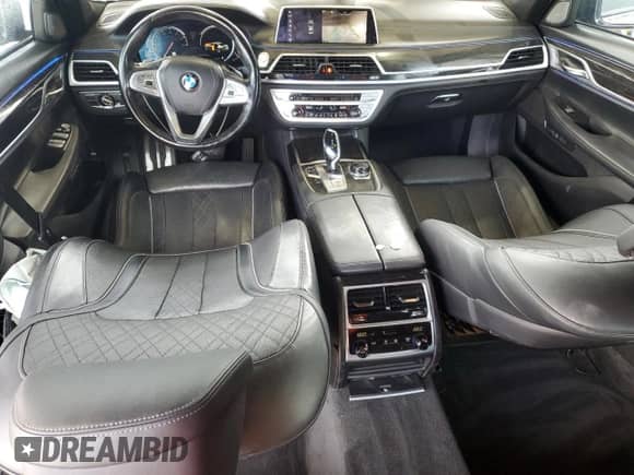 2018 BMW 7 Series 750i with VIN WBA7F0C56JGM22820, listed as a Copart auction lot 84008985 with 82,715 mi miles and Salvage title. Bid and sale history available at DreamBid. Image 8.