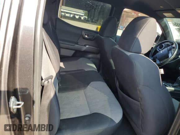2020 Toyota Tacoma SR5 с VIN 3TMAZ5CN0LM118016, выставлен на аукционе Copart как лот 80166295 с пробегом 82 935 миль миль и Списание • Salvage title. История ставок и продаж доступна на DreamBid. Изображение 10.