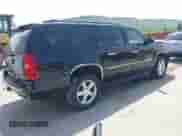2009 Chevrolet Suburban LTZ z VIN 1GNFK36349R294901, wystawiony jako IAAI lot #42160500 z przebiegiem 178 800 mil mil oraz . Historia ofert i sprzedaży dostępna na DreamBid. Obrazek 4.
