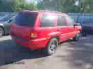2000 Jeep Grand Cherokee Limited z VIN 1J4GW58N5YC186410, wystawiony jako IAAI lot #42504152 z przebiegiem 140 982 mil mil oraz . Historia ofert i sprzedaży dostępna na DreamBid. Obrazek 4.