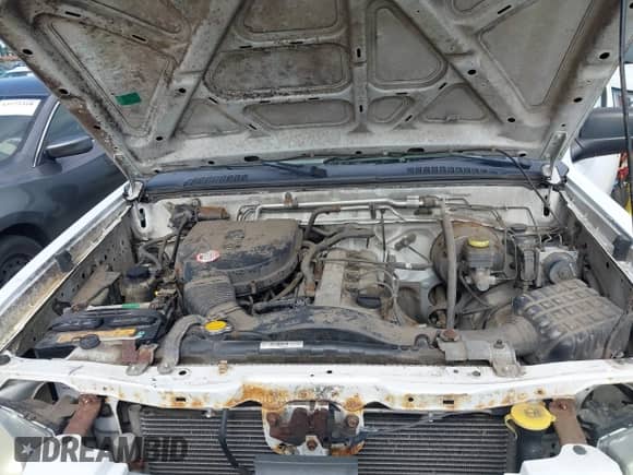 2004 Nissan Frontier XE with VIN 1N6DD26T34C425796, listed as a IAAI auction lot 43154982 with 151,548 mi miles and . Bid and sale history available at DreamBid. Image 10.