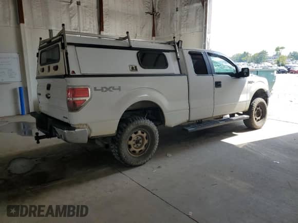 2013 Ford F-150 XL z VIN 1FTFX1EFXDKE78364, wystawiony jako Copart lot #68697825 z przebiegiem 210 549 mil mil oraz Szkoda całkowita • Salvage title. Historia ofert i sprzedaży dostępna na DreamBid. Obrazek 3.