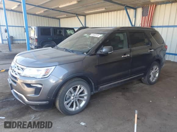 2018 Ford Explorer Limited z VIN 1FM5K8F84JGC86158, wystawiony jako Copart lot #81842015 z przebiegiem 169 703 mil mil oraz Czysty tytuł • Clean title. Historia ofert i sprzedaży dostępna na DreamBid. Obrazek 1.