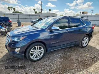 2018 Chevrolet Equinox Premier with VIN 3GNAXNEX1JS633613, listed as a Copart auction lot 80985185 with 87,243 mi miles and Salvage title. Bid and sale history available at DreamBid. Image 1.