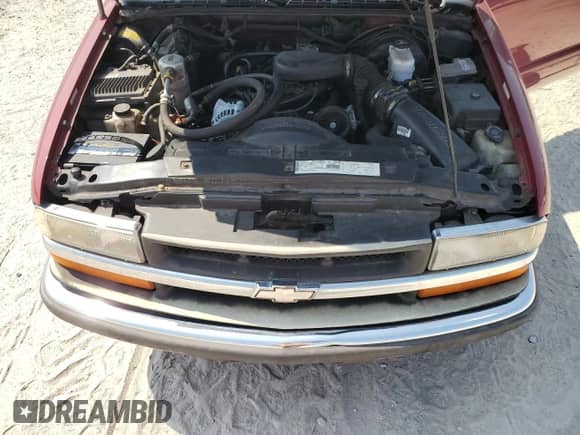 2000 Chevrolet S-10 LS z VIN 1GCCS19W6Y8189643, wystawiony jako Copart lot #70045075 z przebiegiem Nie podano mil oraz Czysty tytuł • Clean title. Historia ofert i sprzedaży dostępna na DreamBid. Obrazek 11.
