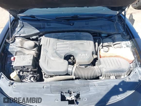 2017 Dodge Charger SXT with VIN 2C3CDXHG9HH571848, listed as a IAAI auction lot 43214318 with 87,799 mi miles and . Bid and sale history available at DreamBid. Image 10.