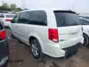 2013 Dodge Grand Caravan American Value with VIN 2C4RDGBG8DR723671, listed as a IAAI auction lot 43257680 with 166,197 mi miles and . Bid and sale history available at DreamBid. Image 3.
