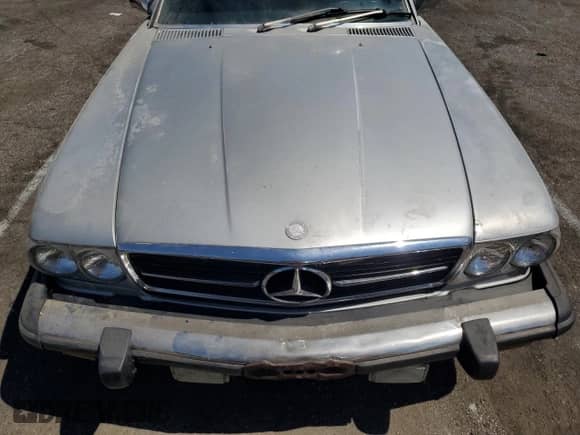 1985 Mercedes-Benz SL с VIN WDBBA45C5FA016213, выставлен на аукционе Copart как лот 71033114 с пробегом 219 276 миль миль и Чистый • Clean title. История ставок и продаж доступна на DreamBid. Изображение 11.