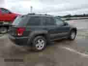 2005 Jeep Grand Cherokee Laredo with VIN 1J4GS48KX5C563594, listed as a Copart auction lot 69724645 with 189,716 mi miles and Salvage title. Bid and sale history available at DreamBid. Image 3.