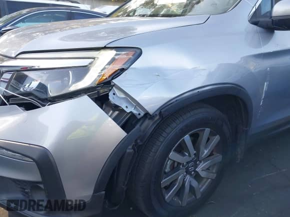 2020 Honda Pilot EX z VIN 5FNYF5H38LB010438, wystawiony jako IAAI lot #43196412 z przebiegiem 64 526 mil mil oraz . Historia ofert i sprzedaży dostępna na DreamBid. Obrazek 6.