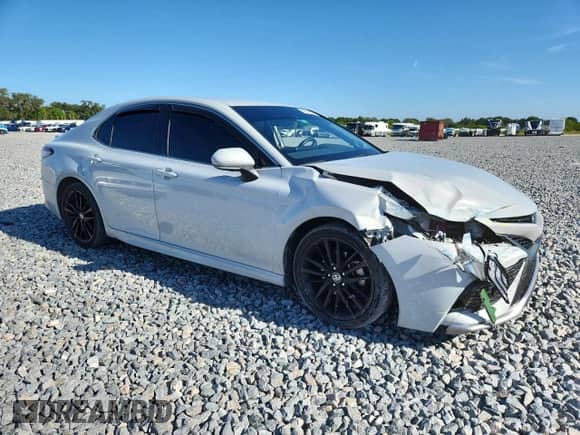 2022 Toyota Camry Hybrid XSE с VIN 4T1K31AK3NU043491, выставлен на аукционе Copart как лот 69072655 с пробегом 80 851 миль миль и Списание • Salvage title. История ставок и продаж доступна на DreamBid. Изображение 4.