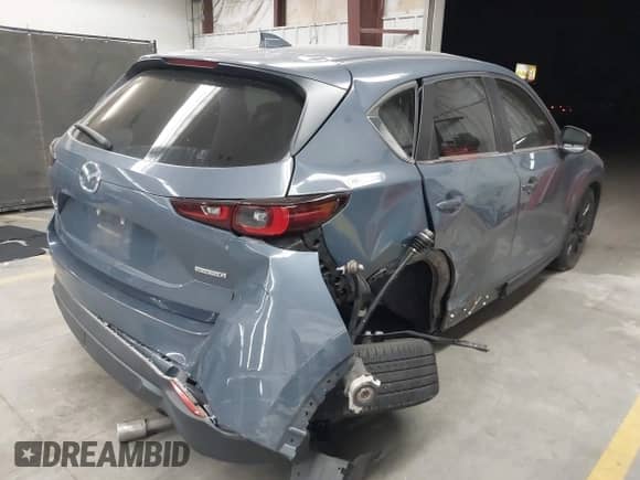 2023 Mazda CX-5 S Preferred z VIN JM3KFBCM3P0282220, wystawiony jako IAAI lot #43188220 z przebiegiem 29 080 mil mil oraz . Historia ofert i sprzedaży dostępna na DreamBid. Obrazek 4.
