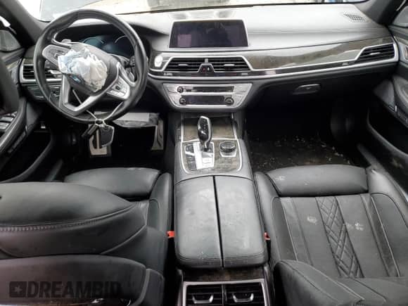 2017 BMW 7 Series 750i with VIN WBA7F0C39HGM21864, listed as a Copart auction lot 61645304 with Not provided miles and Salvage title. Bid and sale history available at DreamBid. Image 8.