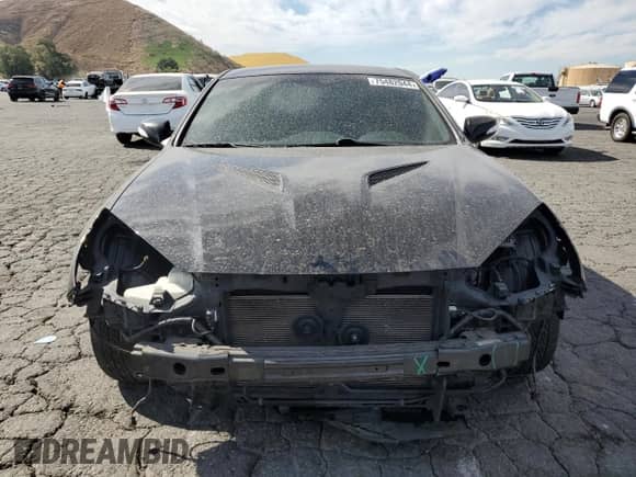 2013 Hyundai Genesis Coupe R-Spec with VIN KMHHU6KJ5DU104090, listed as a Copart auction lot 77754234 with 100,939 mi miles and Salvage title. Bid and sale history available at DreamBid. Image 5.