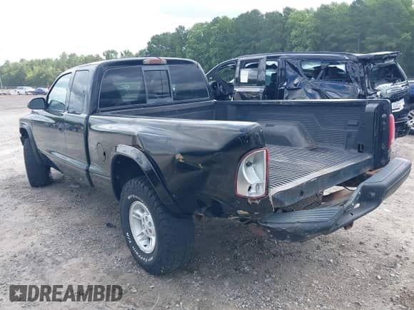 1998 Dodge Dakota with VIN 1B7GG22X6WS714048, listed as a IAAI auction lot 42728244 with 185,255 mi miles and . Bid and sale history available at DreamBid. Image 3.