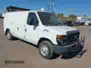 2014 Ford Econoline Cargo Commercial with VIN 1FTNE1EL7EDA59384, listed as a IAAI auction lot 43391909 with 306,342 mi miles and . Bid and sale history available at DreamBid. Image 1.