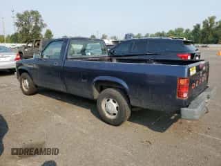 1994 Dodge Dakota z VIN 1B7FL26XXRS606540, wystawiony jako Copart lot #70103064 z przebiegiem 123 850 mil mil oraz Czysty tytuł • Clean title. Historia ofert i sprzedaży dostępna na DreamBid. Obrazek 2.