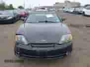 2003 Hyundai Tiburon GT с VIN KMHHN65FX3U087872, выставлен на аукционе IAAI как лот 42607169 с пробегом 196 005 миль миль и . История ставок и продаж доступна на DreamBid. Изображение 12.