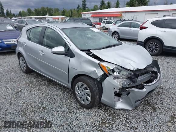 2015 Toyota Prius One z VIN JTDKDTB37F1098842, wystawiony jako IAAI lot #42599025 z przebiegiem 87 264 mil mil oraz . Historia ofert i sprzedaży dostępna na DreamBid. Obrazek 1.