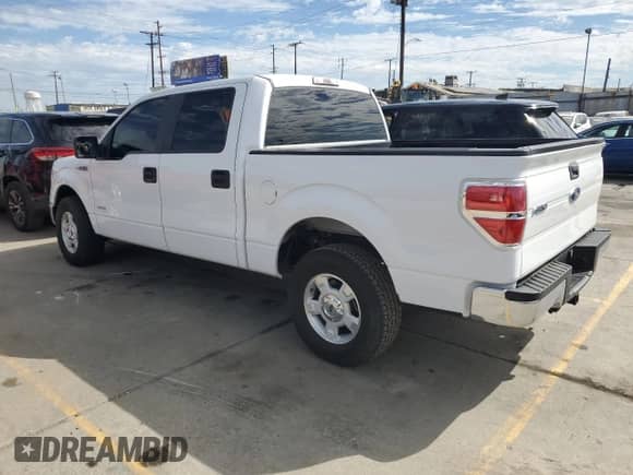 2014 Ford F-150 XLT с VIN 1FTFW1CT1EKE22892, выставлен на аукционе Copart как лот 86332765 с пробегом 14 203 миль миль и Списание • Salvage title. История ставок и продаж доступна на DreamBid. Изображение 2.