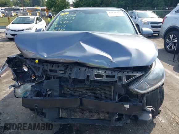 2018 Hyundai Accent SE z VIN 3KPC24A33JE024857, wystawiony jako IAAI lot #43279253 z przebiegiem 131 782 mil mil oraz . Historia ofert i sprzedaży dostępna na DreamBid. Obrazek 6.