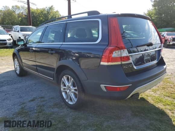 2016 Volvo XC70 z VIN YV4612NMXG1237885, wystawiony jako Copart lot #80944375 z przebiegiem 131 090 mil mil oraz Czysty tytuł • Clean title. Historia ofert i sprzedaży dostępna na DreamBid. Obrazek 3.