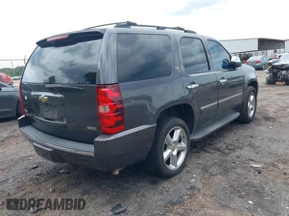 2010 Chevrolet Tahoe LTZ with VIN 1GNUCCE0XAR144758, listed as a IAAI auction lot 43280909 with 186,278 mi miles and . Bid and sale history available at DreamBid. Image 4.