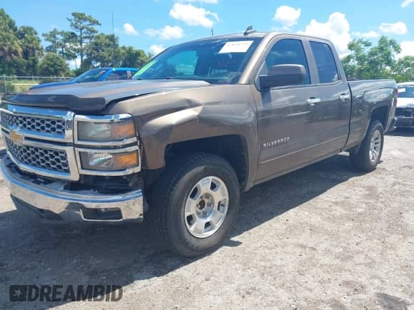 2015 Chevrolet Silverado 1500 LT with VIN 1GCRCREC8FZ306552, listed as a IAAI auction lot 42826732 with 115,741 mi miles and . Bid and sale history available at DreamBid. Image 2.