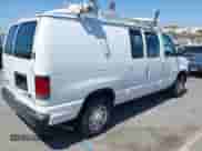 2013 Ford Econoline Cargo Commercial with VIN 1FTNE1EW2DDA35728, listed as a IAAI auction lot 42503659 with 195,340 mi miles and . Bid and sale history available at DreamBid. Image 4.