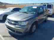 2012 Dodge Journey SE z VIN 3C4PDCAB1CT372670, wystawiony jako IAAI lot #42281044 z przebiegiem 185 388 mil mil oraz . Historia ofert i sprzedaży dostępna na DreamBid. Obrazek 2.