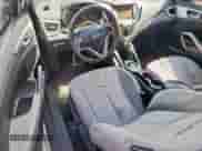 2012 Hyundai Veloster w/Red Int z VIN KMHTC6ADXCU036716, wystawiony jako Copart lot #63408115 z przebiegiem 144 117 mil mil oraz Szkoda całkowita • Salvage title. Historia ofert i sprzedaży dostępna na DreamBid. Obrazek 8.