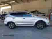 2017 Hyundai Santa Fe 2.4L z VIN 5XYZT3LB1HG496347, wystawiony jako IAAI lot #43306805 z przebiegiem 126 233 mil mil oraz . Historia ofert i sprzedaży dostępna na DreamBid. Obrazek 14.