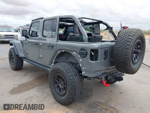2021 Jeep Wrangler Unlimited Rubicon with VIN 1C4JJXFG8MW842795, listed as a IAAI auction lot 42571315 with 31,004 mi miles and . Bid and sale history available at DreamBid. Image 3.