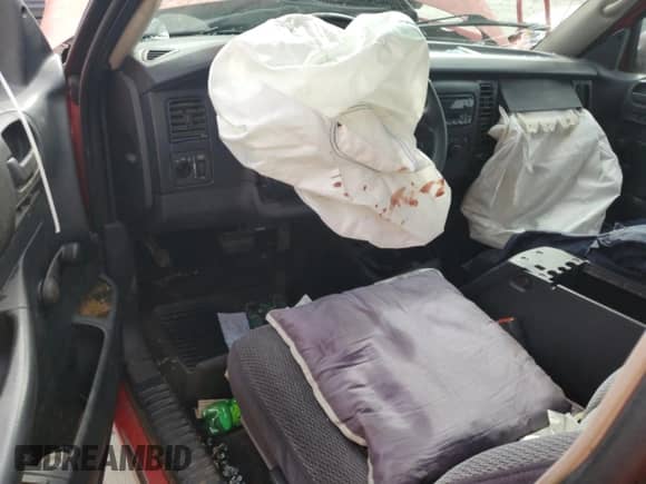 2003 Dodge Dakota z VIN 1D7HL12X23S136834, wystawiony jako Copart lot #85117105 z przebiegiem Nie podano mil oraz Nie do naprawy • Non repairable. Historia ofert i sprzedaży dostępna na DreamBid. Obrazek 8.