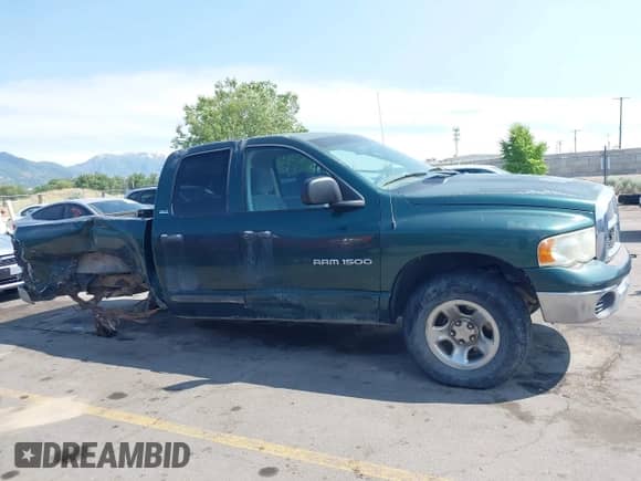 2002 Dodge 1500 z VIN 3D7HU18N92G129260, wystawiony jako IAAI lot #42373899 z przebiegiem 143 976 mil mil oraz . Historia ofert i sprzedaży dostępna na DreamBid. Obrazek 14.
