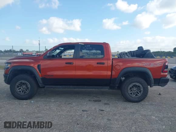 2024 Ram 1500 TRX с VIN 1C6SRFU98RN223288, выставлен на аукционе IAAI как лот 42150583 с пробегом 3 615 миль миль и . История ставок и продаж доступна на DreamBid. Изображение 15.