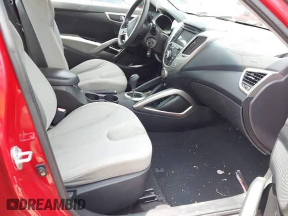 2012 Hyundai Veloster w/Black Int с VIN KMHTC6AD7CU049570, выставлен на аукционе IAAI как лот 42265051 с пробегом 79 896 миль миль и . История ставок и продаж доступна на DreamBid. Изображение 5.