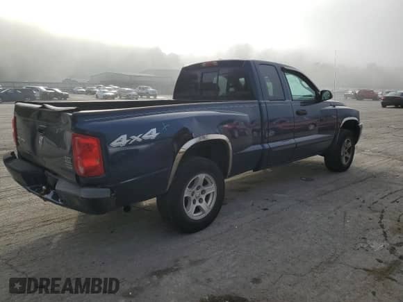 2007 Dodge Dakota SLT с VIN 1D7HW42PX7S138328, выставлен на аукционе Copart как лот 84390095 с пробегом 98 279 миль миль и Списание • Salvage title. История ставок и продаж доступна на DreamBid. Изображение 3.