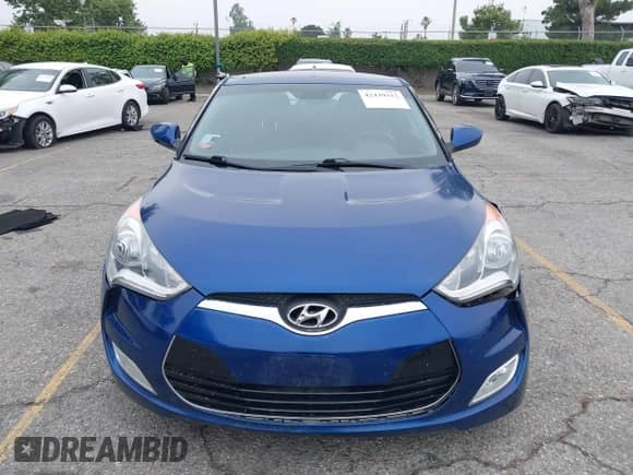 2015 Hyundai Veloster z VIN KMHTC6AD0FU243328, wystawiony jako IAAI lot #42439313 z przebiegiem 96 997 mil mil oraz . Historia ofert i sprzedaży dostępna na DreamBid. Obrazek 12.