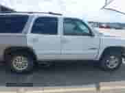 2000 Chevrolet Tahoe LS z VIN 1GNEC13T9YJ185431, wystawiony jako IAAI lot #42517482 z przebiegiem 211 711 mil mil oraz . Historia ofert i sprzedaży dostępna na DreamBid. Obrazek 13.