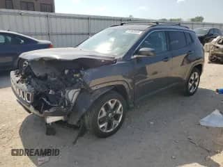 2019 Jeep Compass Limited with VIN 3C4NJDCB1KT621065, listed as a Copart auction lot 81983025 with 106,745 mi miles and Salvage title. Bid and sale history available at DreamBid. Image 1.