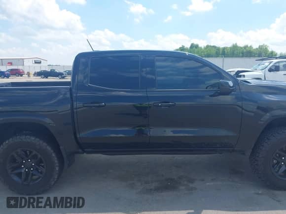 2023 Chevrolet Colorado 4WD Z71 with VIN 1GCPTDEK1P1209999, listed as a IAAI auction lot 42265017 with 13,754 mi miles and . Bid and sale history available at DreamBid. Image 14.