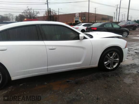 2013 Dodge Charger SXT with VIN 2C3CDXJG9DH541155, listed as a IAAI auction lot 41123246 with 118,392 mi miles and . Bid and sale history available at DreamBid. Image 13.