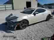 2014 Scion FR-S z VIN JF1ZNAA1XE8708292, wystawiony jako Copart lot #69932195 z przebiegiem 247 484 mil mil oraz Szkoda całkowita • Salvage title. Historia ofert i sprzedaży dostępna na DreamBid. Obrazek 1.
