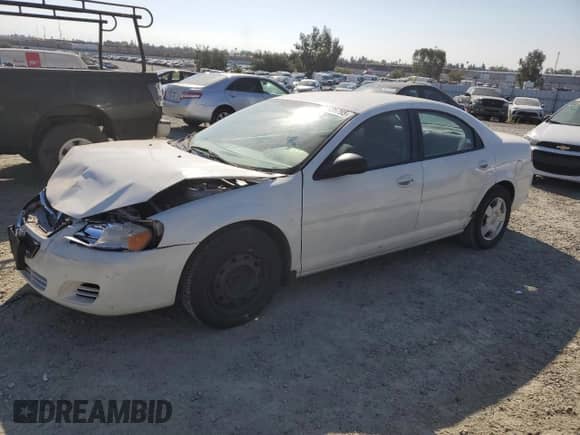 2005 Dodge Stratus SXT with VIN 1B3EL46X05N558208, listed as a Copart auction lot 71926795 with 111,312 mi miles and Salvage title. Bid and sale history available at DreamBid. Image 1.